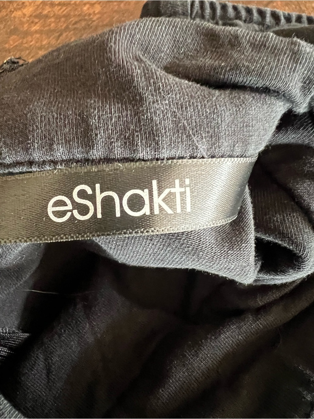 eshakti Sleeveless Black Midi Dress with Asymmetrical Button Placket - Picture 6 of 12